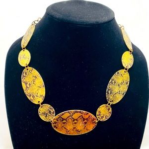 Gold tone with black necklace